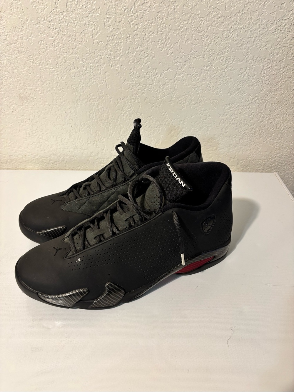 Jordan 14 “Black Ferrari” in Black with Red Detail
